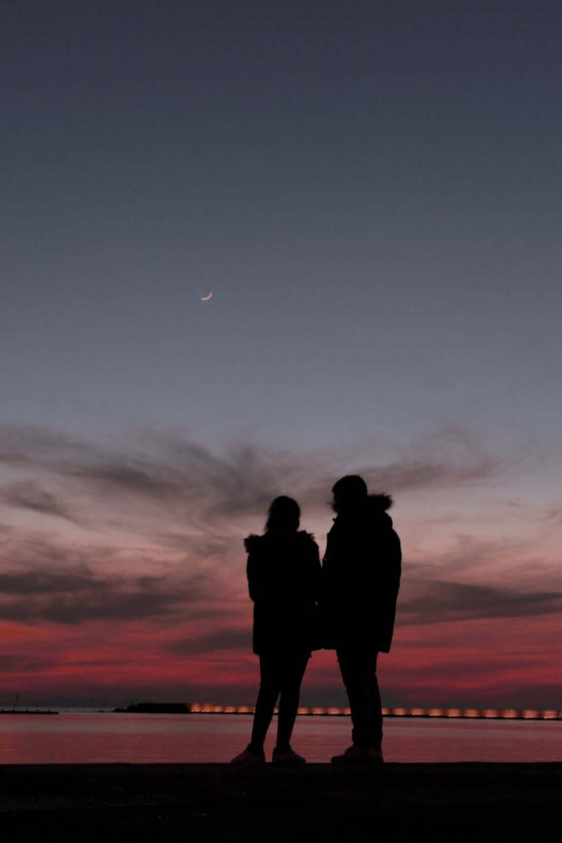 A couple's silhouette during sunset